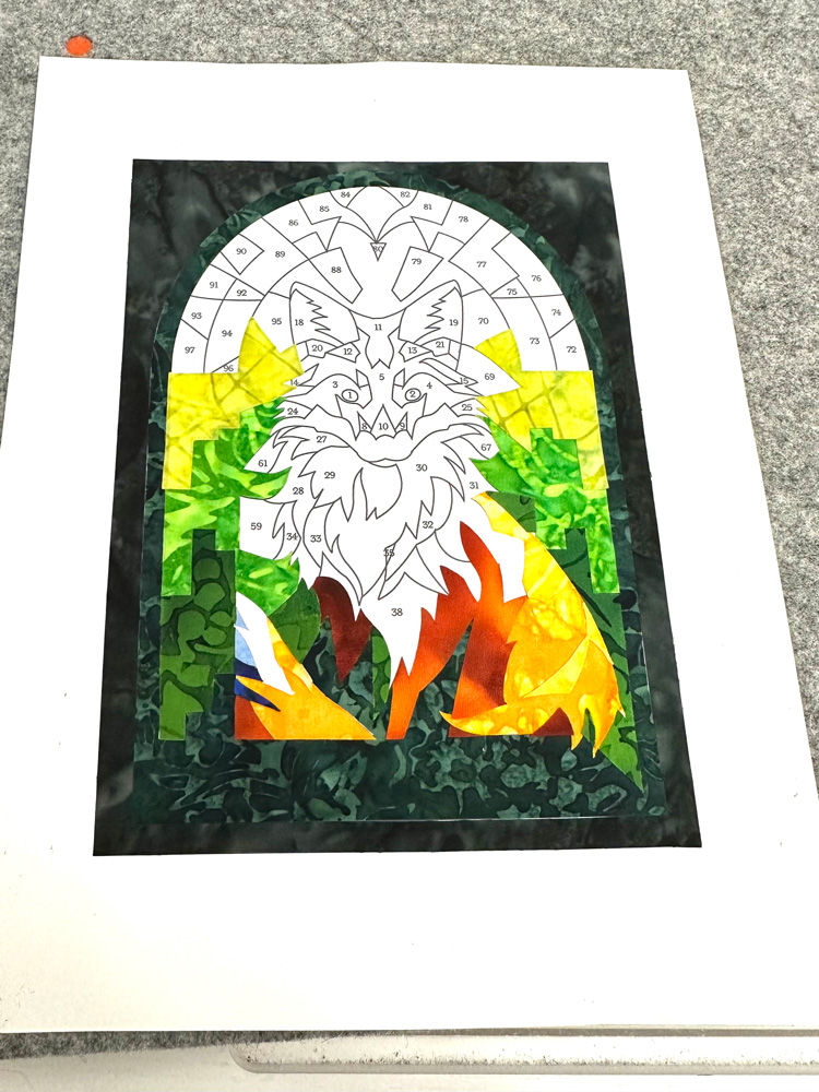 Assembling the stained glass fox design