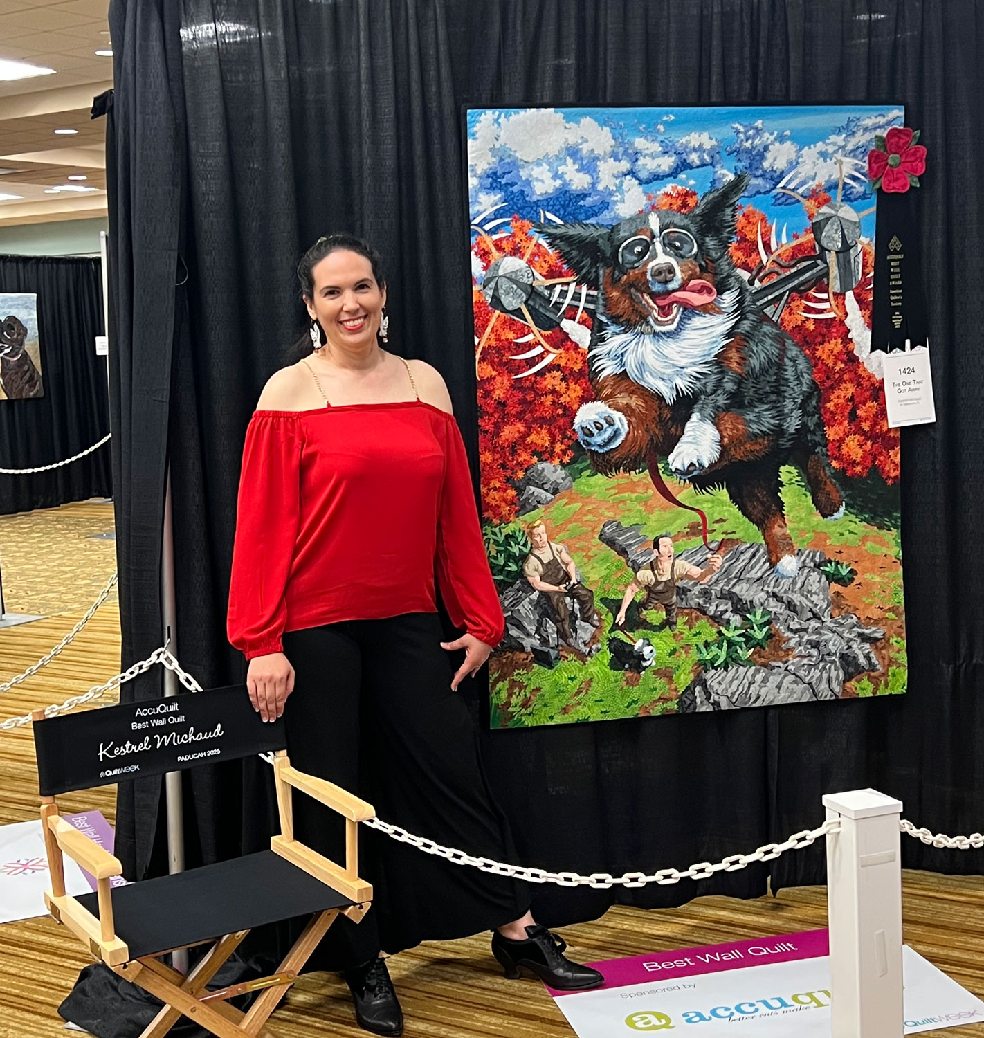 Kestrel and her quilt on the show floor at AQS Paducah quilt show