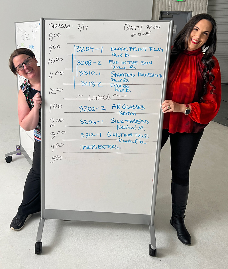 Mel and Kestrel with the day's schedule
